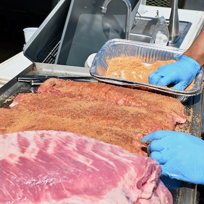picture of rub being applied to meat