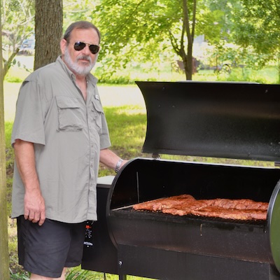 picture of bill cannon at the bbq pit