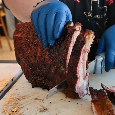 picture of pork spare ribs being sliced