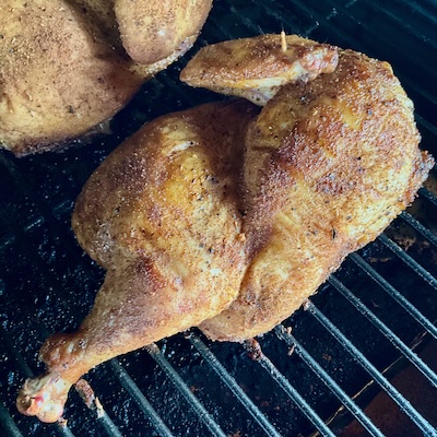 picture of half of a smoked bbq chicken